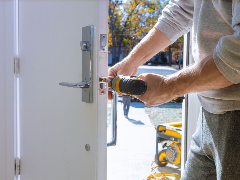 Technician opening a front door